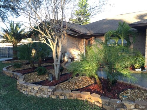 landscaping design side of home yard grass landscaping trees palm bay fl2